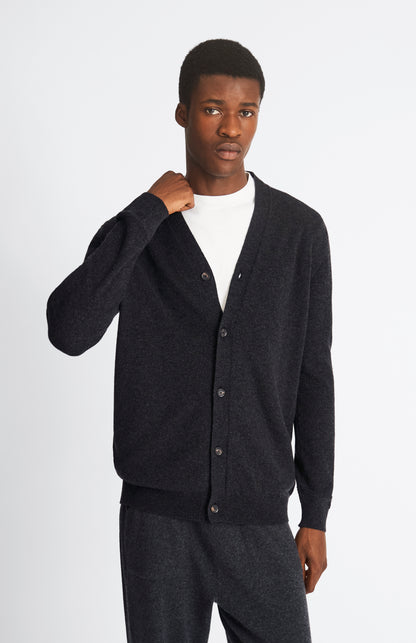 Pringle of Scotland Men's Classic Cashmere Cardigan in Charcoal.   Front Cropped Image on Model