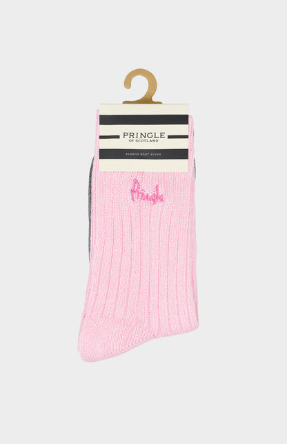 Pink sock with Pringle of Scotland branding on a white background