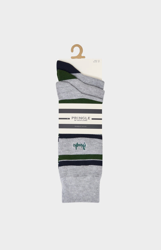 A pack of grey socks with green accents