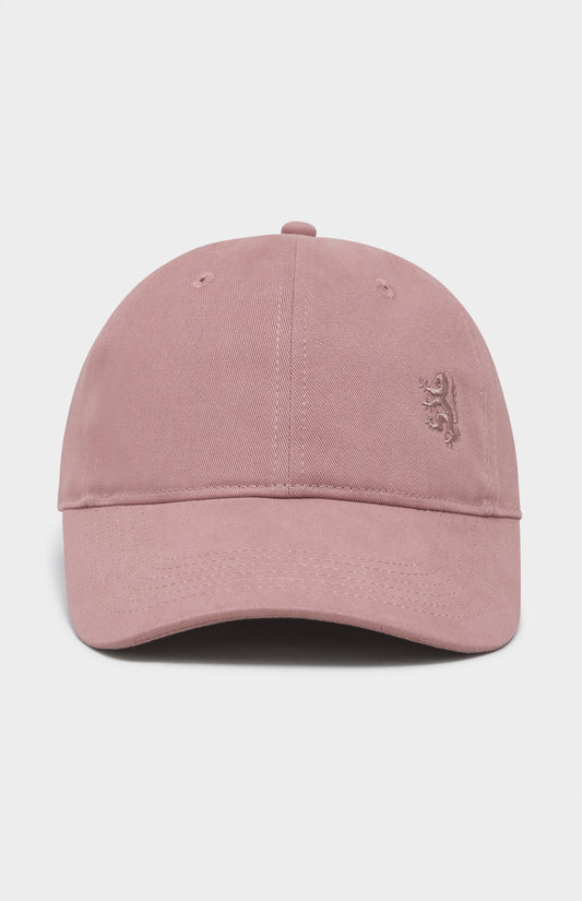 Dusty pink baseball cap with tonal lion logo embroidered on the right hand side