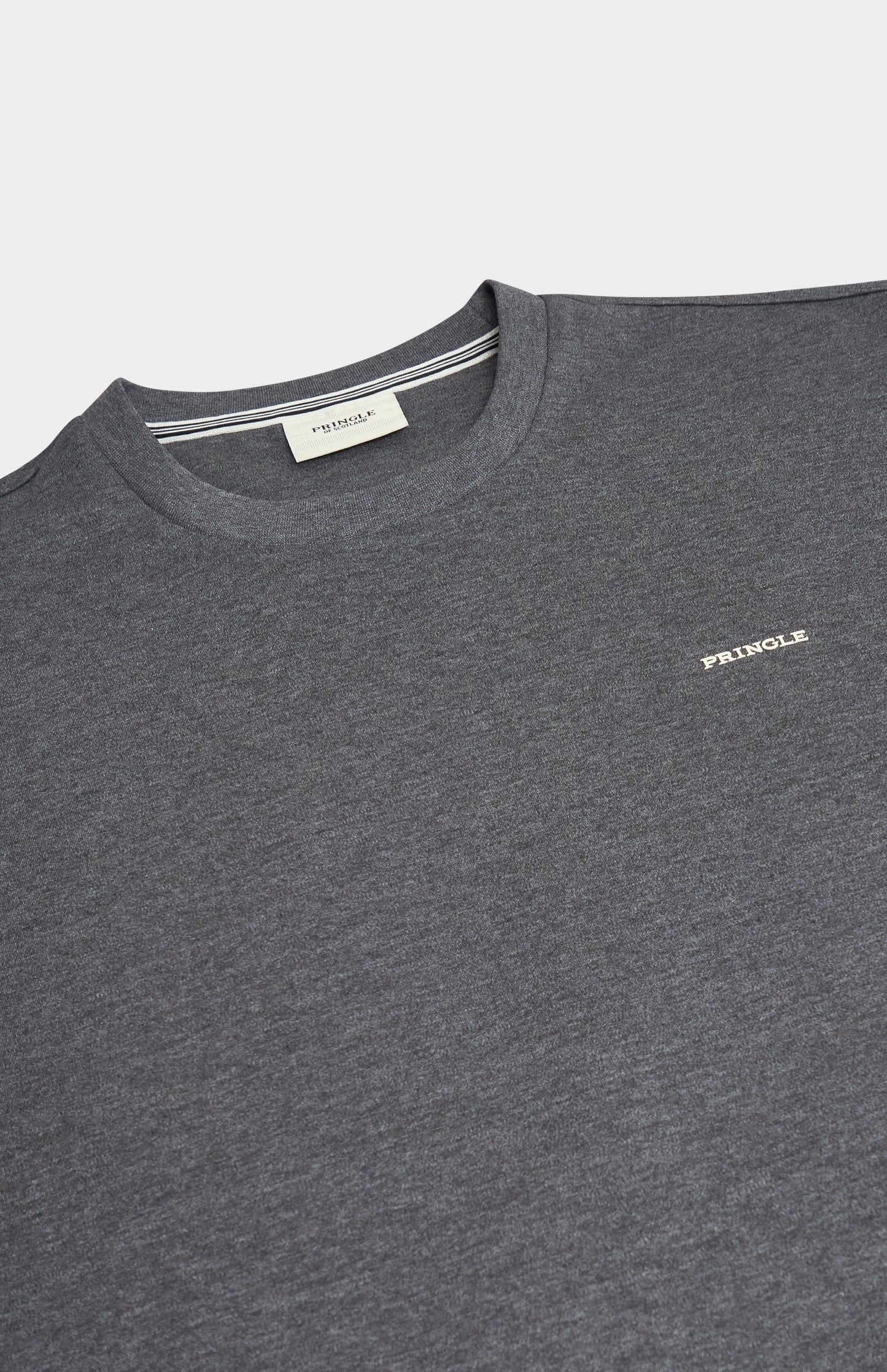 Dark gray t-shirt with a brand logo on a light gray background