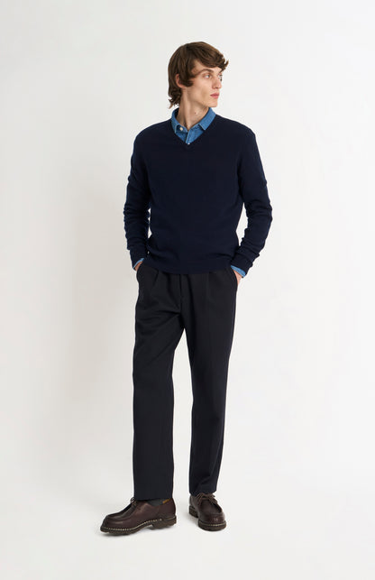 Pringle of Scotland Men’s Cashmere V-Neck Jumper In Navy Blue on standing model