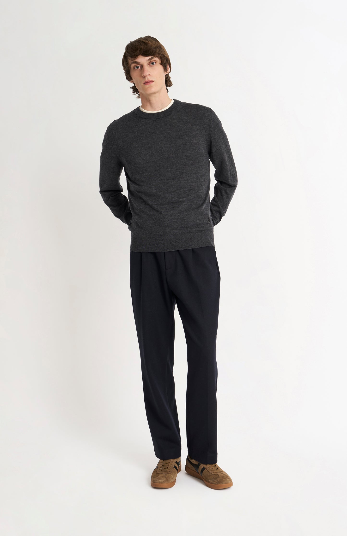 Pringle Men’s Merino Wool Crew Neck Jumper In Charcoal Melange on standing model