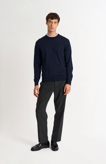 Pringle of Scotland Men’s Merino Wool  Crew Neck Jumper In Navy Blue on standing model