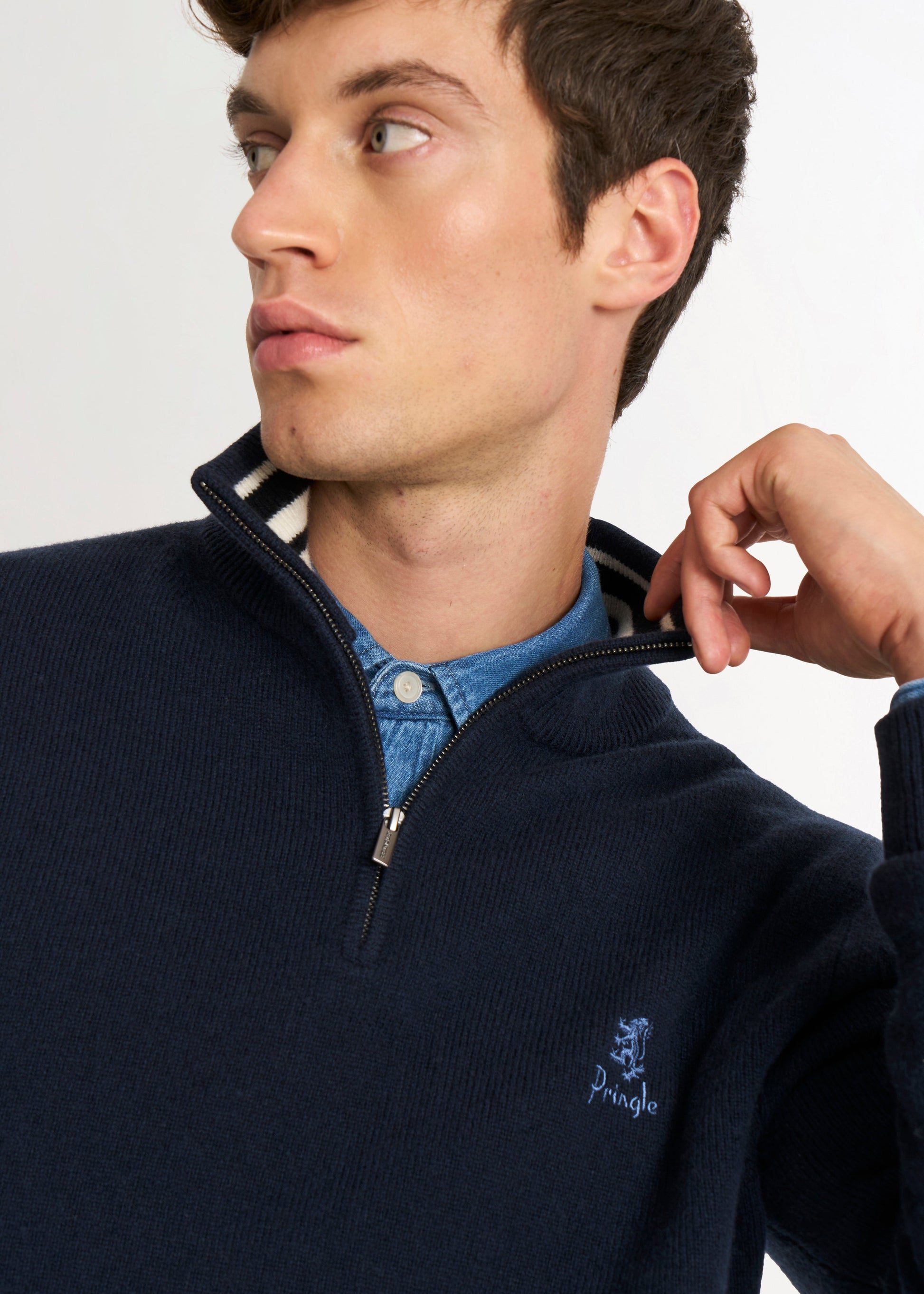 Pringle of Scotland Men’s Lambswool Qtr Zip Jumper In Navy Blue showing zip neck detail;