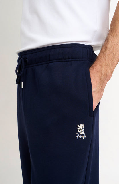 Pringle Men's Track Pants In Navy Blue lion logo embroidery detail