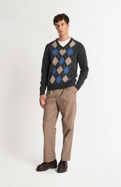 Pringle Men’s Lambswool Argyle V-Neck Jumper in Charcoal, Blue & Mushroom on model fulllength