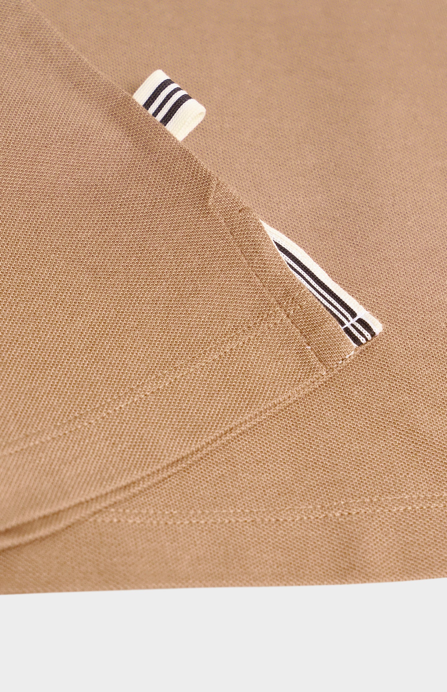 Close-up of a brown polo shirt 