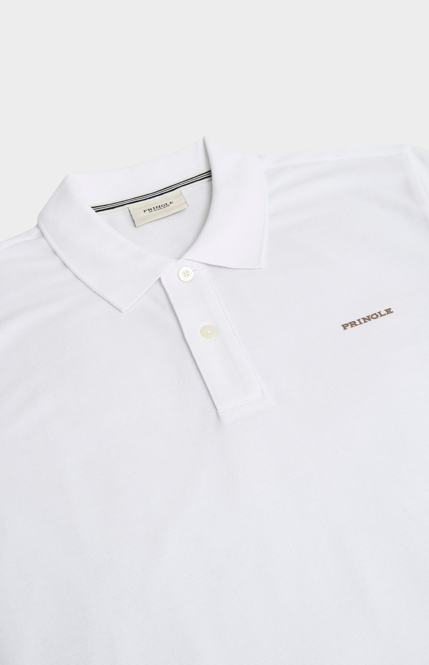 White polo shirt with 'Pringle' branding on a white background