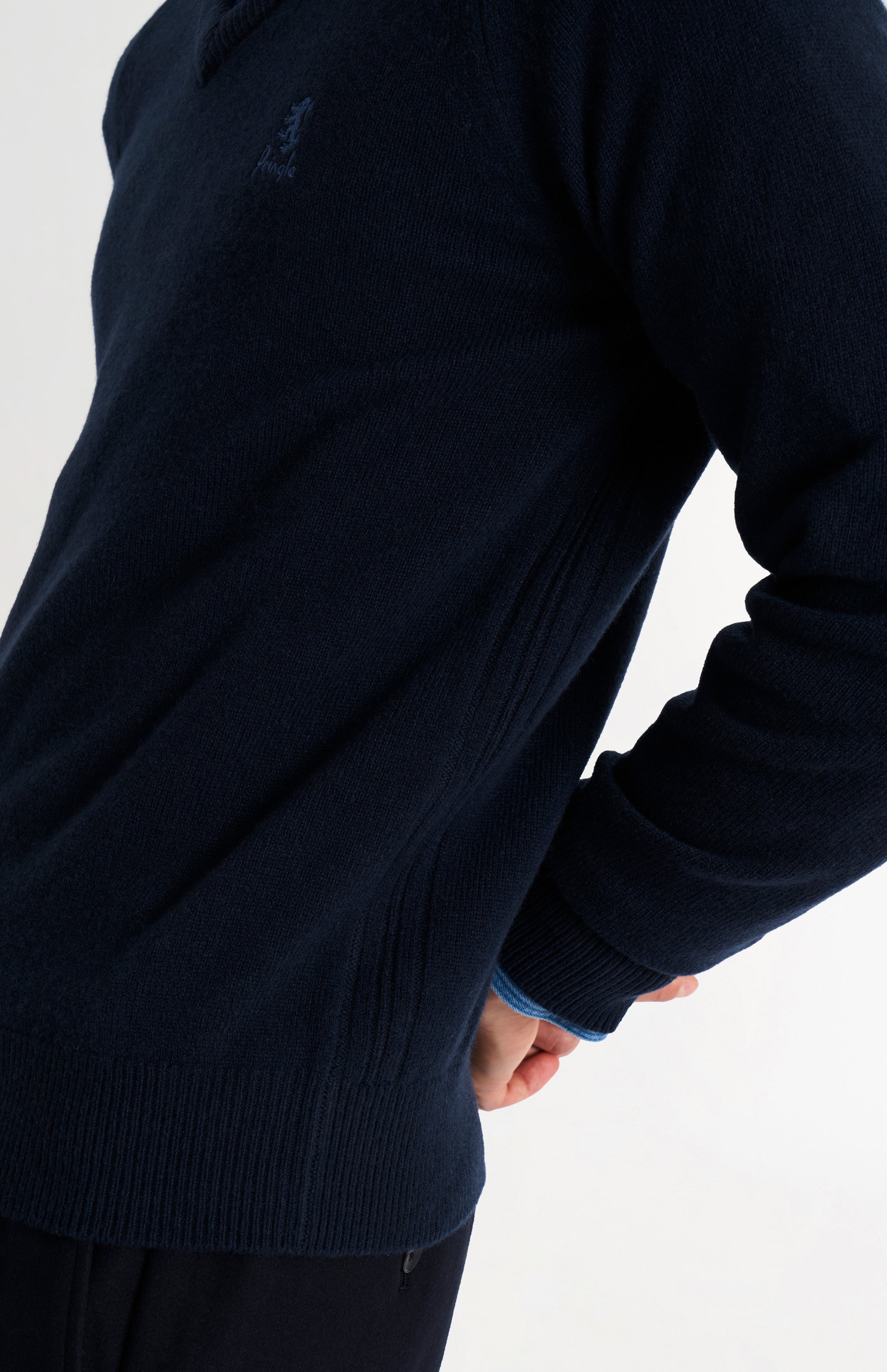 Pringle of Scotland Men’s Lambswool V Neck Jumper In Navy Blue showing button detail