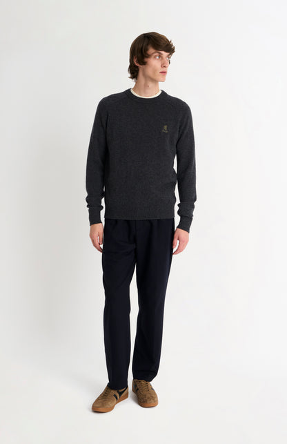 Pringle of Scotland Men’s Lambswool Crew Neck Jumper In Charcoal on model full length